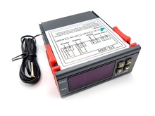 Терморегулятор цифровий DC12V STC-3000 в приладовому корпусі.